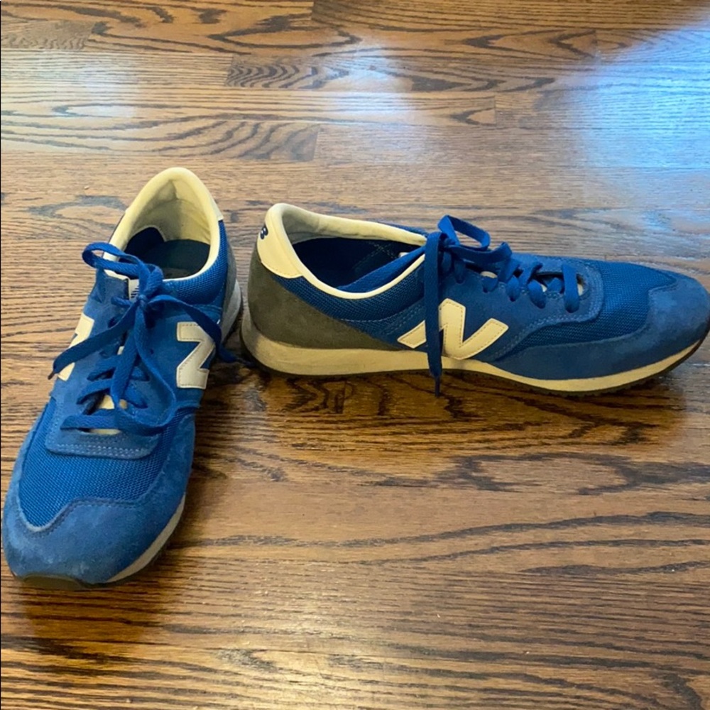 Blue and white new balance 620s size 10.5